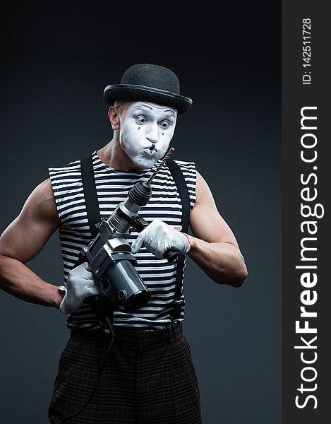 Aggressive Mime Holding Puncher