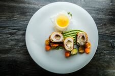 Top View Dissected Chicken Kiev Cutlets With Grilled Vegetables And Sauce Stock Photo Top View Dissected Chicken Kiev Cutlets With Grilled Vegetables And Sauce Stock Photo