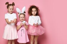 Three Smiling Dressed Up For The Holiday Kid Girls Hold Painted Eggs On Easter Day Stock Images Three Smiling Dressed Up For The Holiday Kid Girls Hold Painted Eggs On Easter Day Stock Images