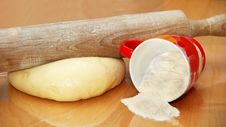 Rolling Pin Over Dough Stock Photography