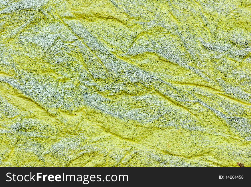 Crinkled metallic paper, suitable for backgrounds or overlays.