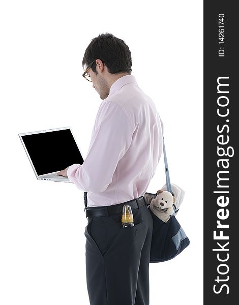 Businessman with laptop, milk bottle and diaper bag. Concept: multi-tasking, modern man
