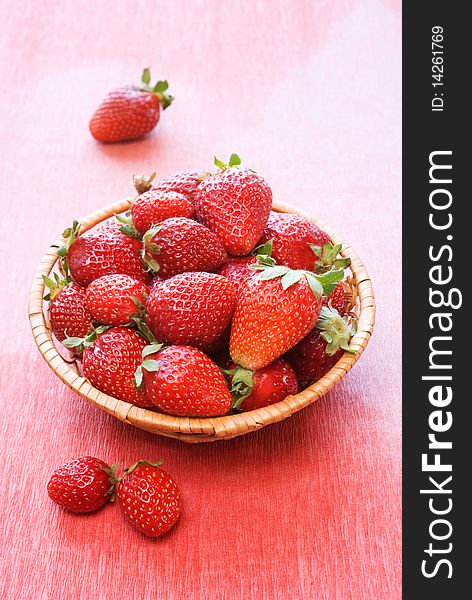 Full wicker basket with fresh strawberries