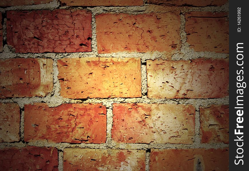 Vintage dark brick wall with shadows