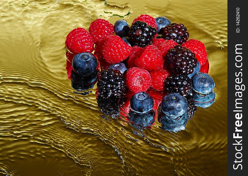 Fresh berries mixed with golden waves. Fresh berries mixed with golden waves