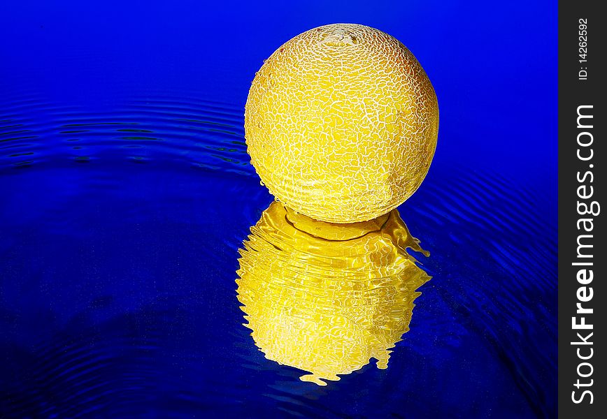 Melon yellow on a blue background. Melon yellow on a blue background