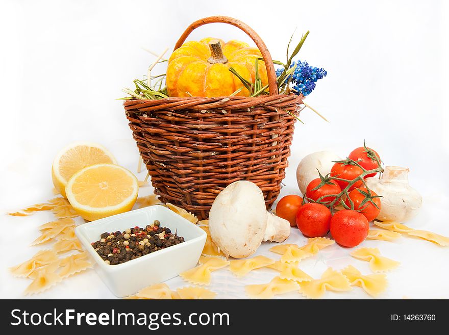 Still-life with fresh vegetables and italian pasta