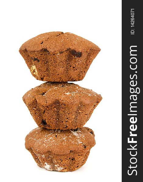 Tower of the chocolate muffin isolated on white background. Tower of the chocolate muffin isolated on white background