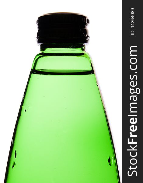 Water in a green glass bottle