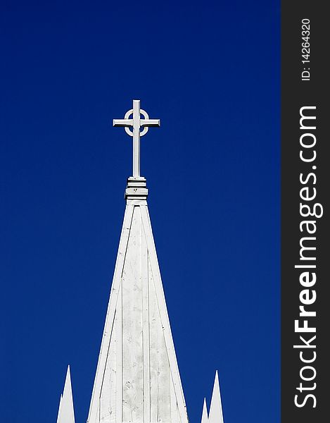Steeple of Church with blue sky in background. Steeple of Church with blue sky in background