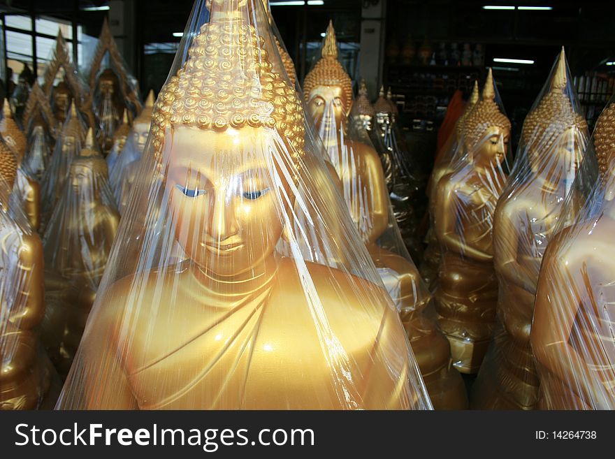 Buddha statues in a shop in Bangkok, Thailand. Buddha statues in a shop in Bangkok, Thailand.