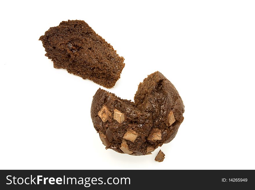 Double Chocolate fondant filled Muffin isolated against white background. Double Chocolate fondant filled Muffin isolated against white background.