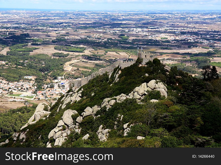 View of the landmark Castelo dos Mouros located on top of the Sintra National Park in Lisbon, Portugal.