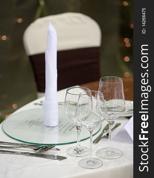 Elegant dinner table with glasses