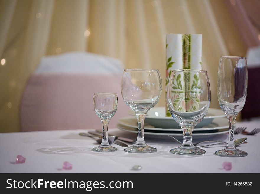 Elegant dinner table with glasses