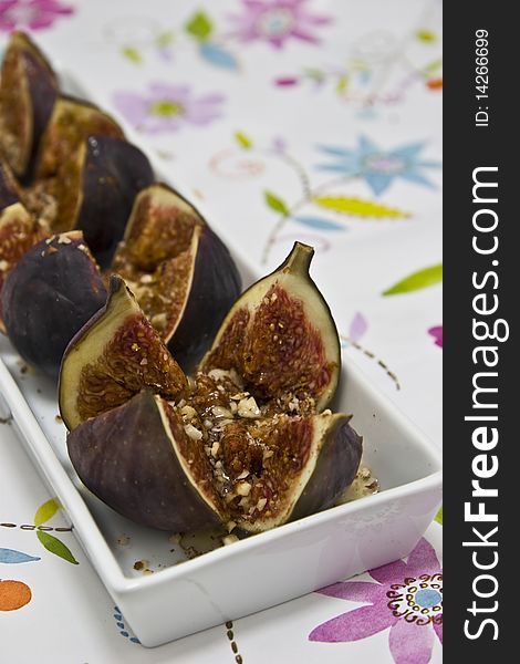 Fig desert with nuts and honey.
