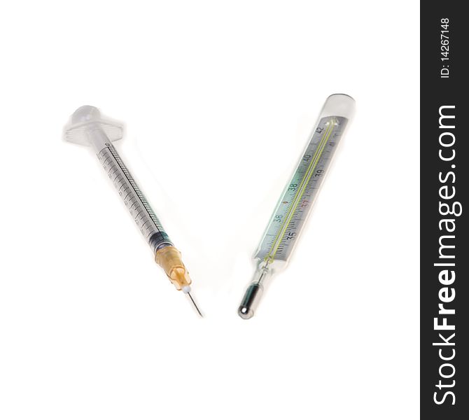 Syringe And A Thermometer On White Background
