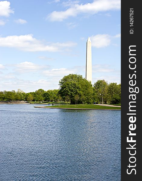 Beautiful Washington Monument landmark view from the park during spring season in USA capital Washington, DC. Beautiful Washington Monument landmark view from the park during spring season in USA capital Washington, DC
