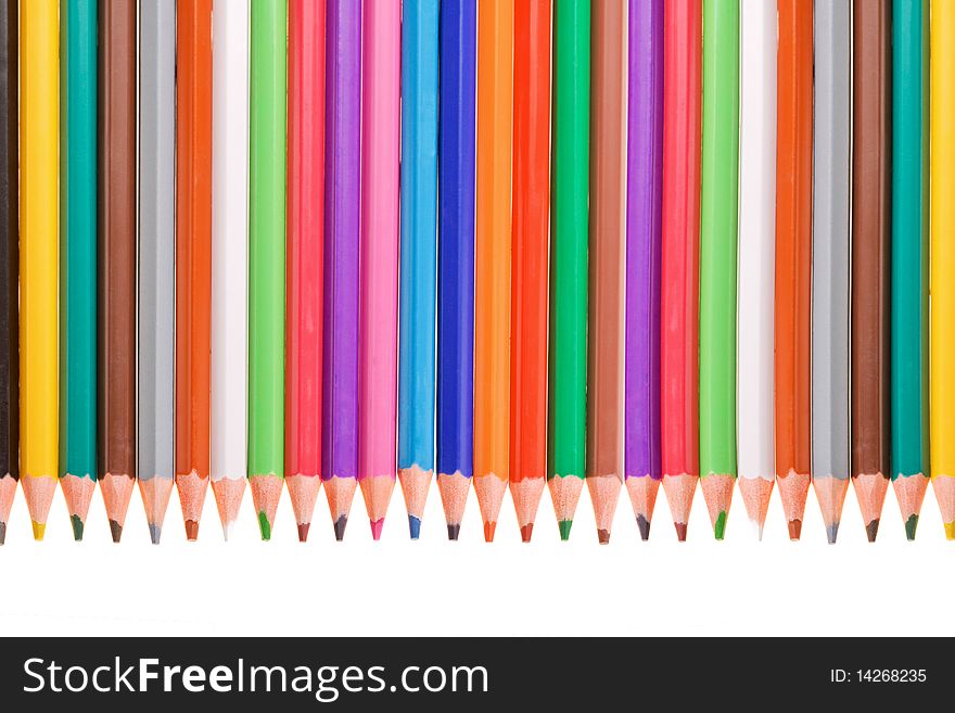 Row of bright color pencils isolated on white