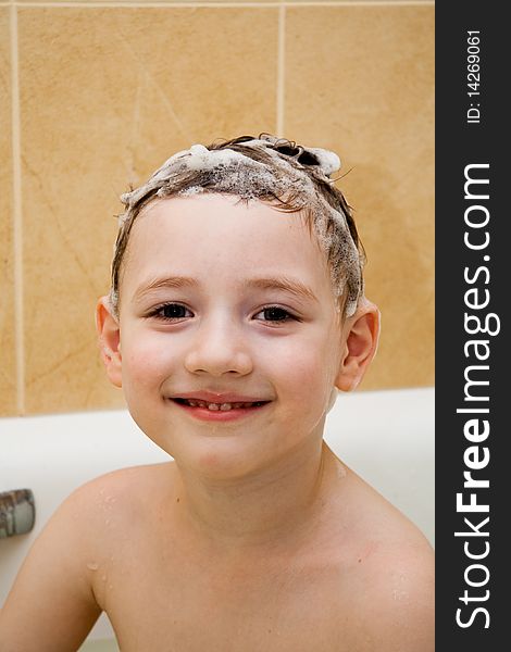 Boy taking a bath