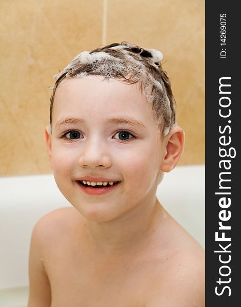 Boy taking a bath