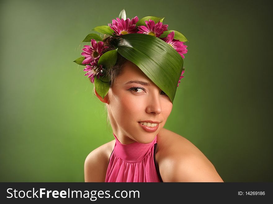 Beautiful spring-woman on green background. Beautiful spring-woman on green background