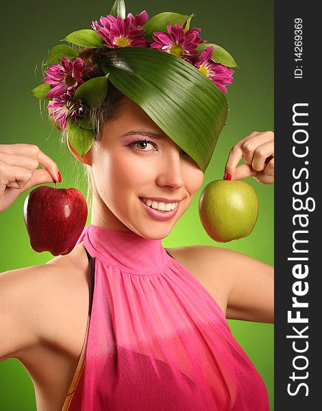 Beautiful spring-woman with two apples. Beautiful spring-woman with two apples