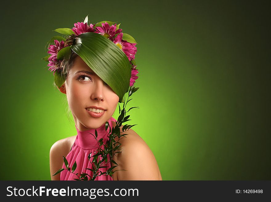 Beautiful spring-woman on green background. Beautiful spring-woman on green background
