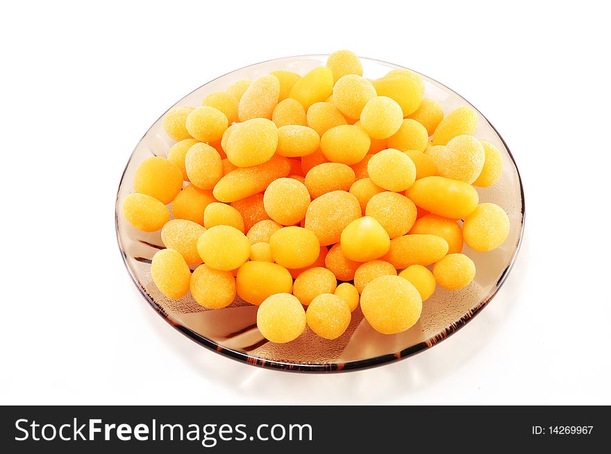 Dried apricots in sugar isolated on a white background. Dried apricots in sugar isolated on a white background