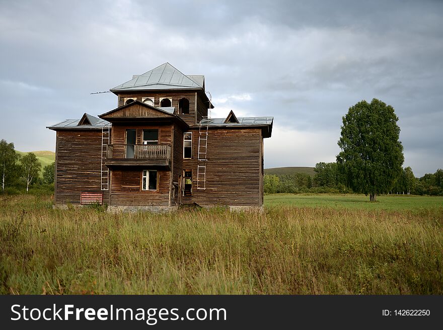 ALTAI REGION, RUSSIA - SEPTEMBER 3, 2018: Abandoned tourist complex `Eldorado` at the mouth of the river Inya Altai Territory