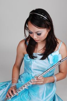Chinese Girl In Dress With Flute. Stock Images Chinese Girl In Dress With Flute. Stock Images