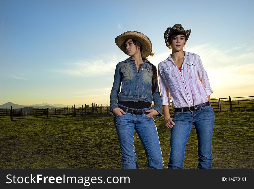 Twin Cowgirls In A Coral
