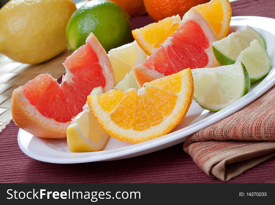 Arrangement of lemon, lime, tangerine, orange and grapefruit fruit. Arrangement of lemon, lime, tangerine, orange and grapefruit fruit