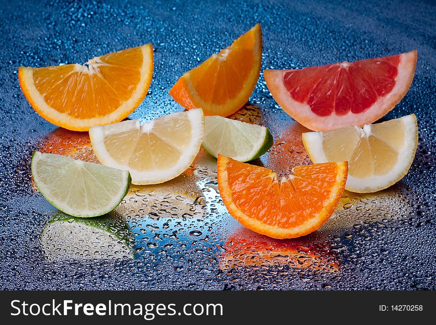 Arrangement of lemon, lime, tangerine, orange and grapefruit fruit. Arrangement of lemon, lime, tangerine, orange and grapefruit fruit