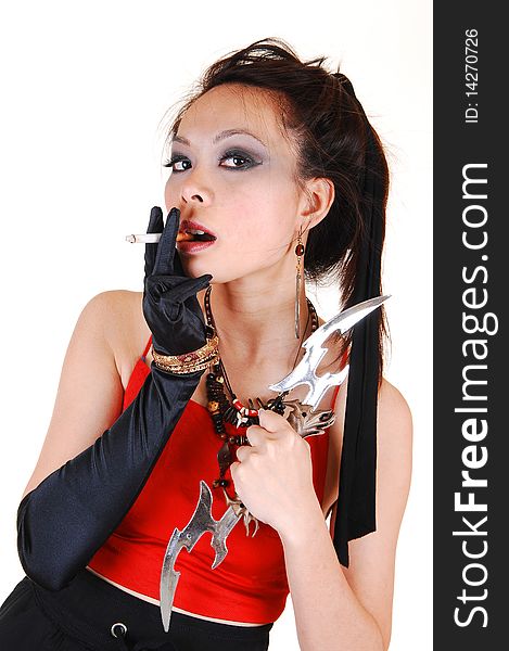 Pretty Asian pirate girl with black cloves and a cigarette in her hand and a sword with a red top and black skirt, for white background. Pretty Asian pirate girl with black cloves and a cigarette in her hand and a sword with a red top and black skirt, for white background.