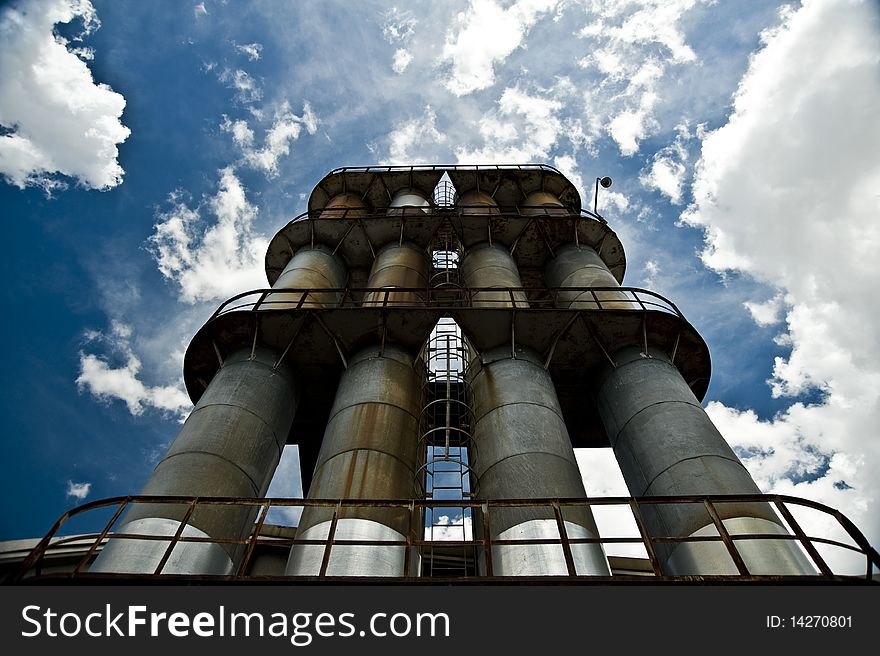 Factory Stacks And Blue Sky