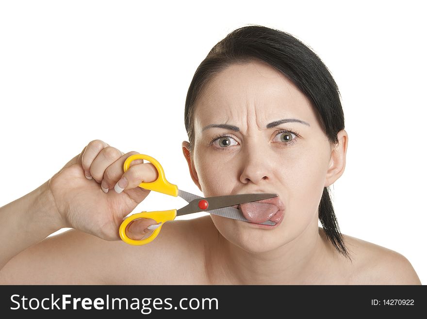 Young woman cuts off to itself tongue isolated in white