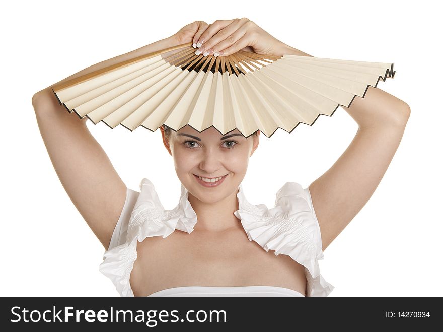 Young woman holds fan over head isolated in white