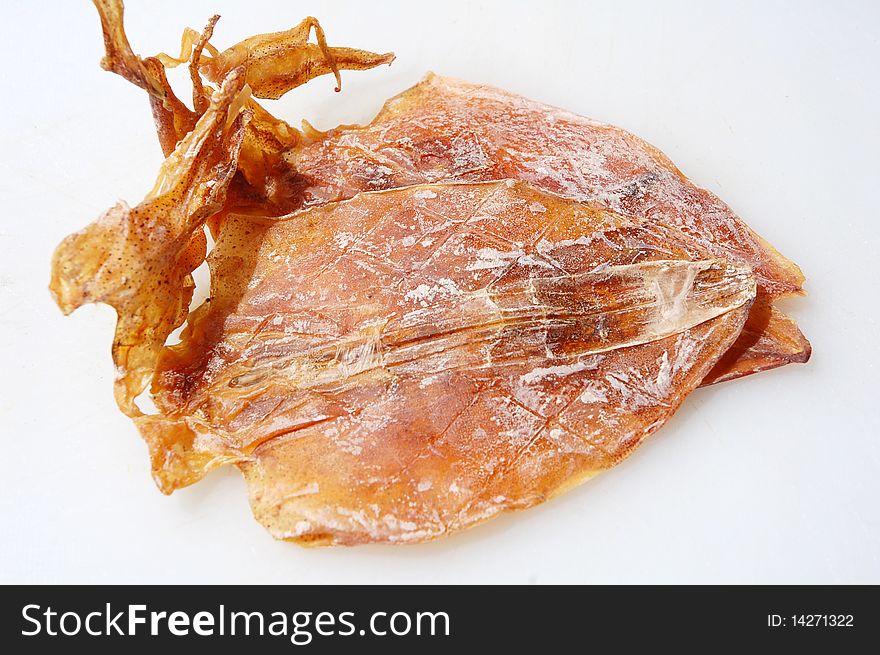 Close up of dried squids with white background