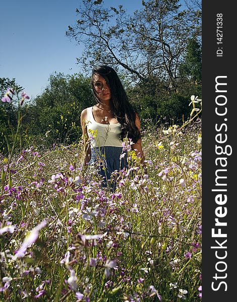 Japanese-Hawaiian female in field of wildflowers. Japanese-Hawaiian female in field of wildflowers