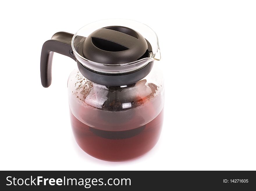 Series. A glass teapot isolated on a white background. Black tea