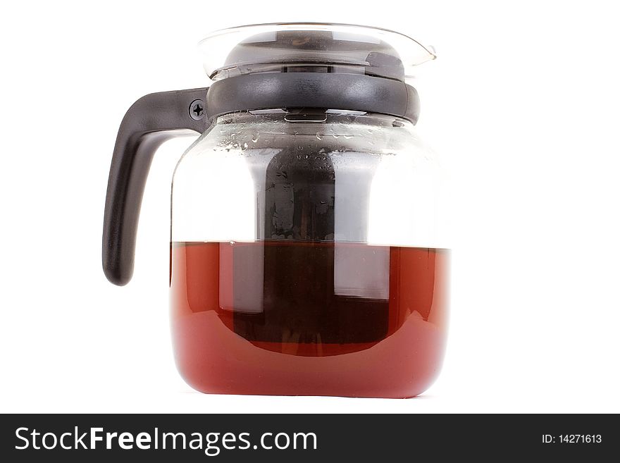 Series. A glass teapot isolated on a white background. Black tea