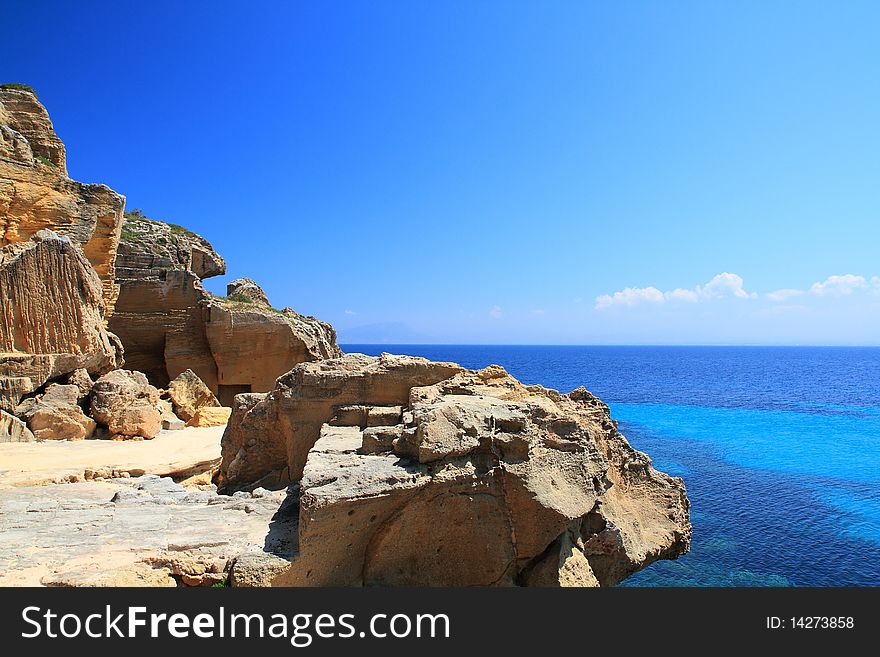 The old quarry tuff favignana now abandoned near the beautiful sea. The old quarry tuff favignana now abandoned near the beautiful sea