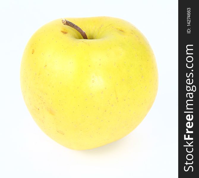 Yellow apple on white background