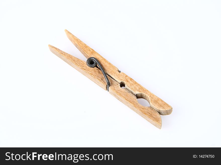 Wooden clothespin on white background