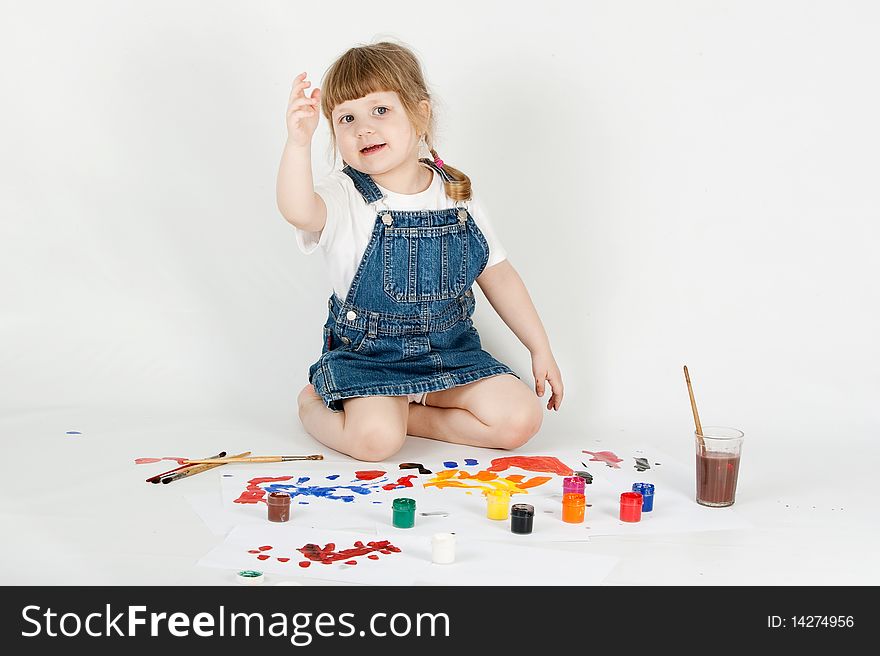 Girl painting on a white background