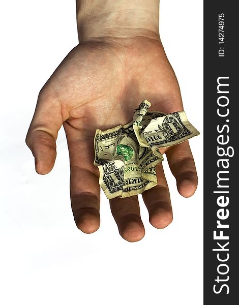 The crumpled American dollar in a hand