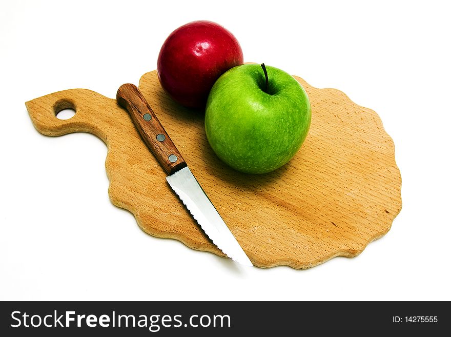 Two different apples which are going to cut for meal preparation. Two different apples which are going to cut for meal preparation