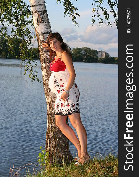 Pregnant female near the lake