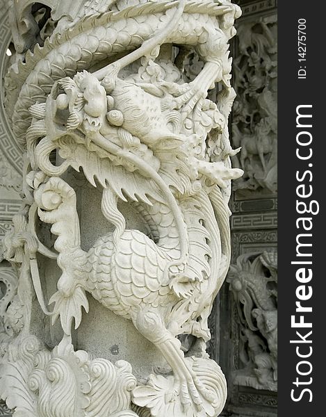 Dragon's stone carving in a buddhist temple